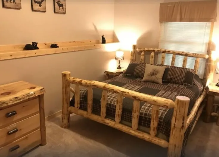 Best Winter Cabins in Wisconsin for Families, beautiful bedroom view of Hana Log Cabin near Devil’s Lake- Baraboo