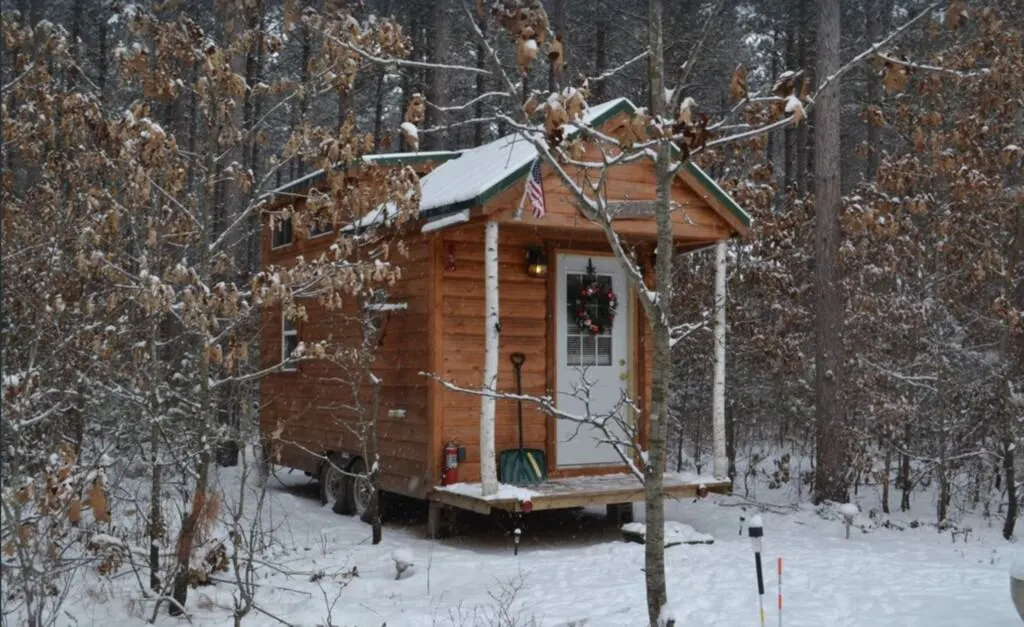 christmas vacation ideas in wisconsin, tiny wood cabin in wisconsin dells