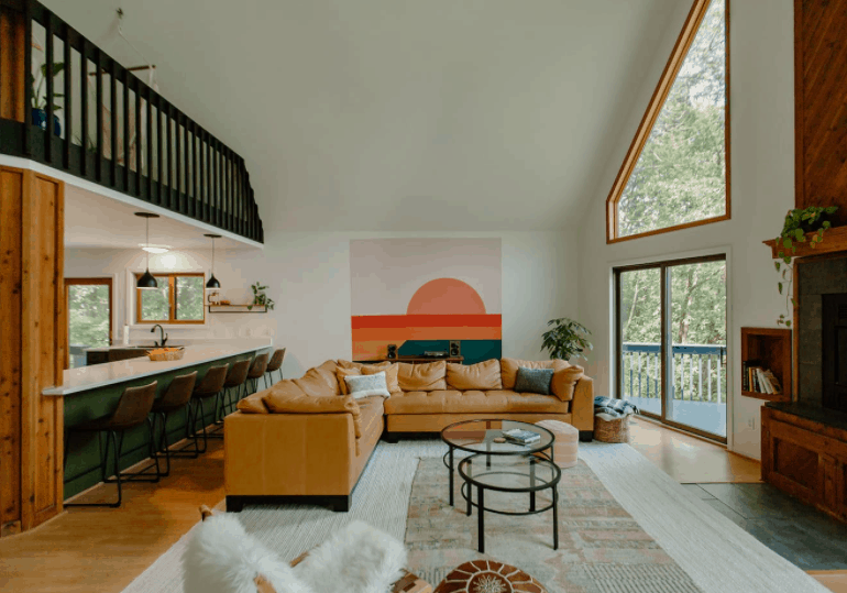Best Airbnb in Wisconsin Dells near Christmas Mountain, Bright and funky open concept living room with stunning views of the bluffs in the distance.