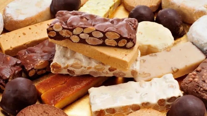 Spanish sweets at christmas, Polvorones and Mantecados piled together