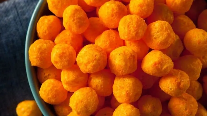 Common spanish christmas food, View of Tetilla Cheese Puffs, balls covered in orange cheese