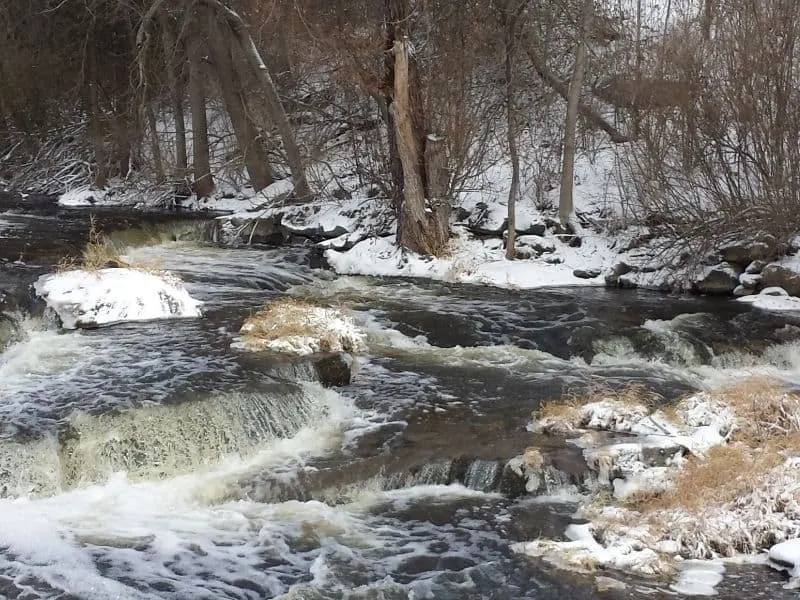 wisconsin christmas getaways, snowy creek and falls in wisconsin