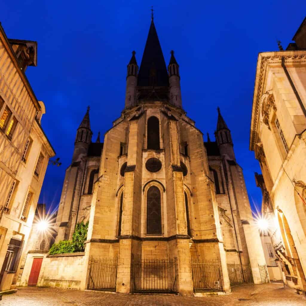 a view of a cathedral during at night with lights