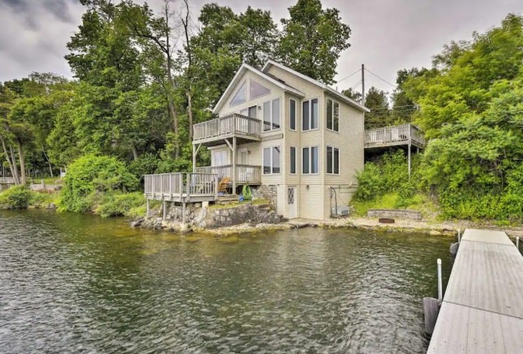 Best luxury cabin in door county, WI, lakefront view of luxury home w/dock, decks & grill