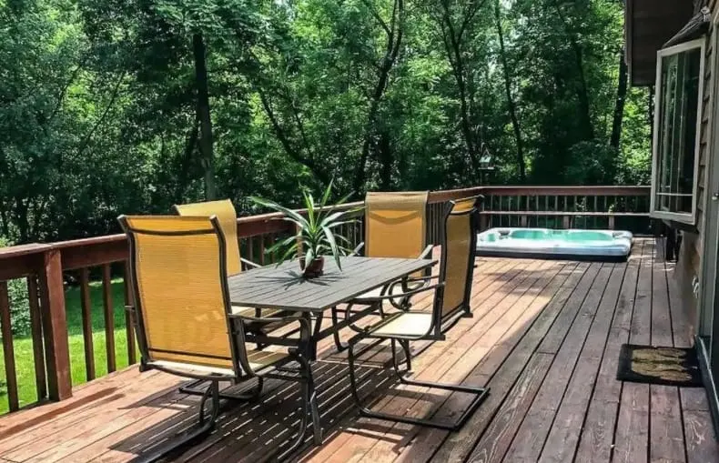 Best cabin with hot tub in southern Wisconsin - swimming pool area side of The Ready Cabin