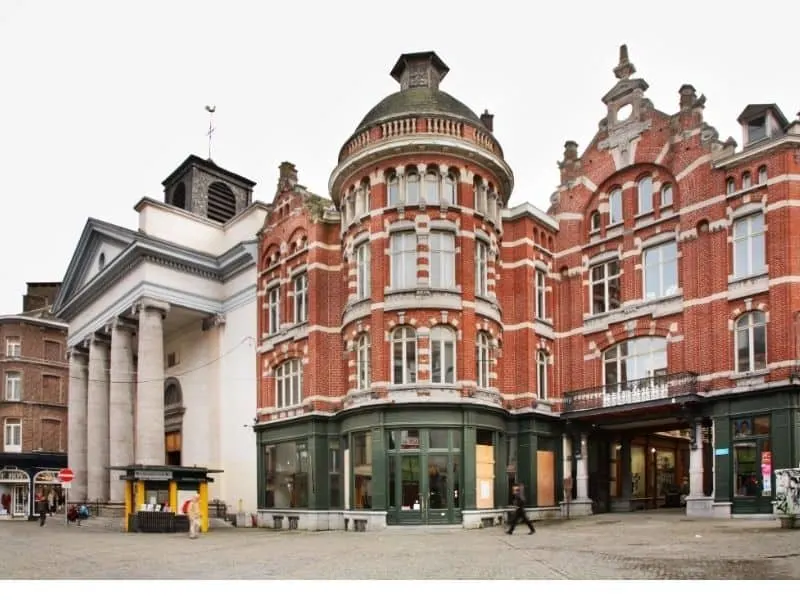 visit Christmas market Charleroi in Belgium, large brick building with rounded windows