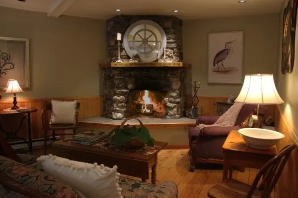 Best Door County places to stay, living room area with seating and a fireplace