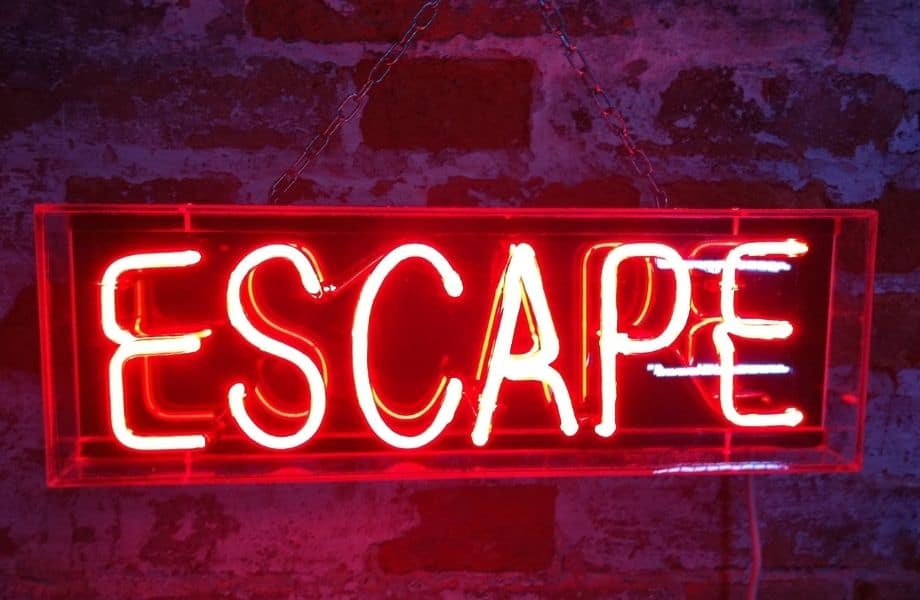 visit Minocqua Wisconsin, neon sign reading ESCAPE