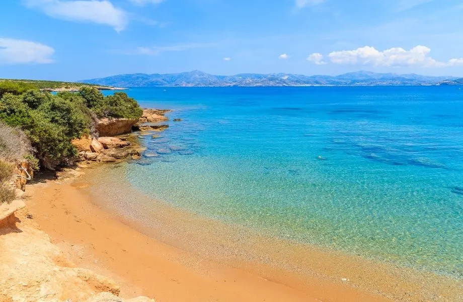 Beautiful beaches in Paros Greece, see-through water at Santa Maria Beach Paros