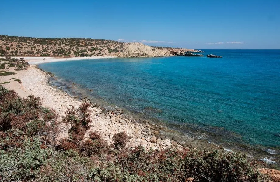best beaches in Paros, Greece, curved shoreline of Tripiti Beach