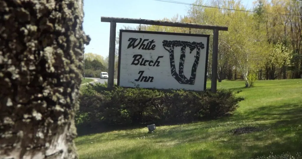 best pet-friendly resorts in Door County, hotel sign reading white birch inn