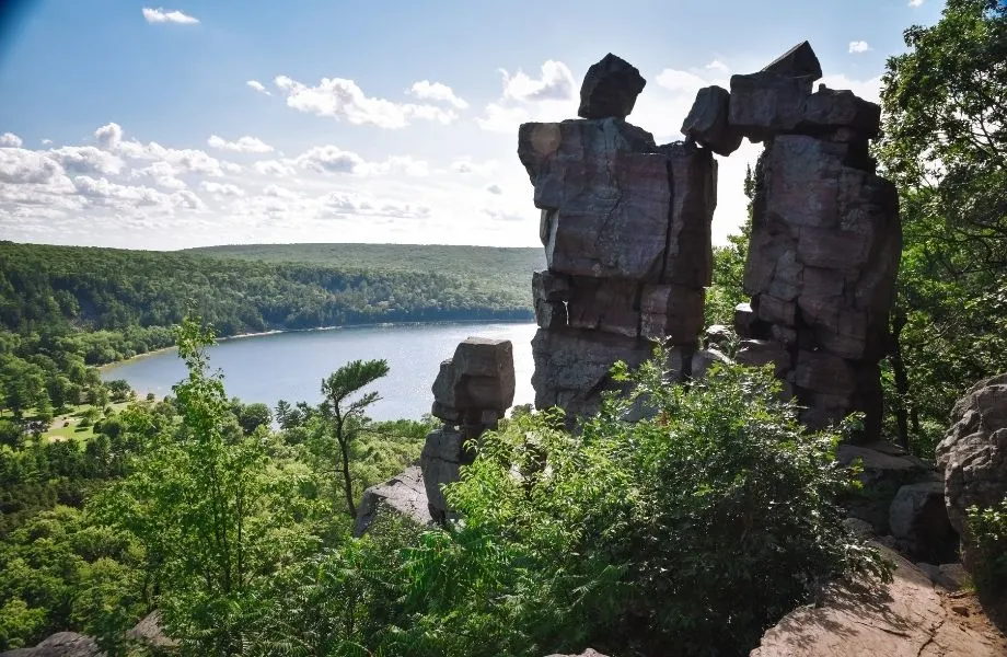 what to do in Wisconsin Dells in March, natural rock formation overlooking lake surrounded by trees