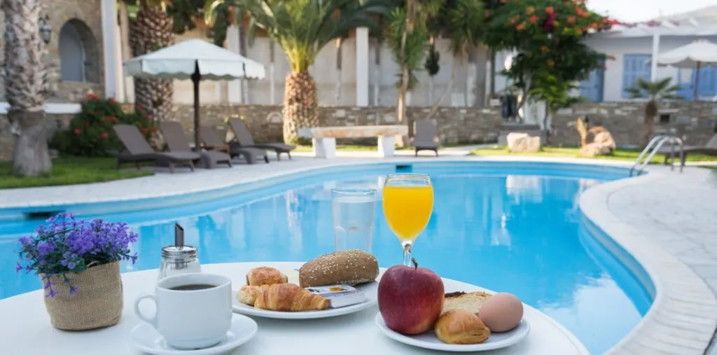Best Resorts in Paros, breakfast spread near the pool at Galinos Hotel