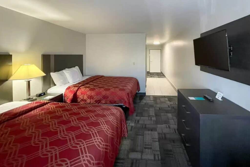 cheap hotels green bay, two beds and tv in room at Clarion Pointe Green Bay