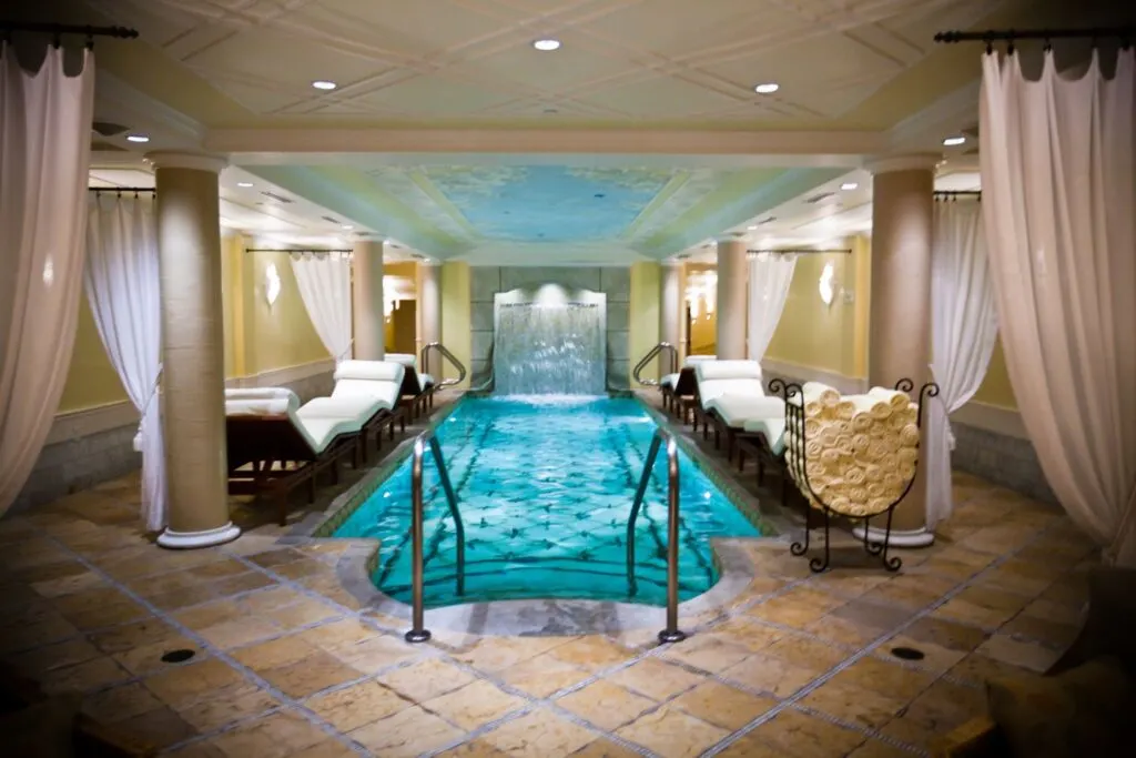 spa breaks for couples, pool spa area with chair beds at Kohler Waters Spa