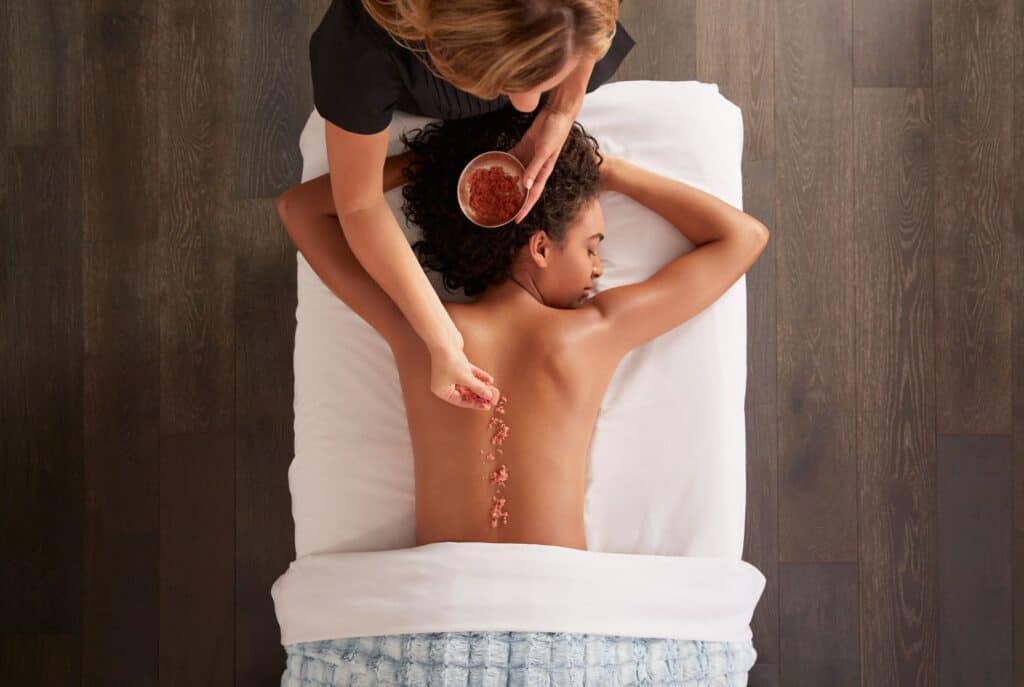 best spa resorts in Wisconsin, woman getting a spa treatment at Kohler Waters Spa
