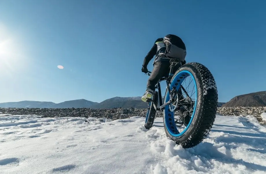 winter sport vacations in Wisconsin, person riding a fat tire bike