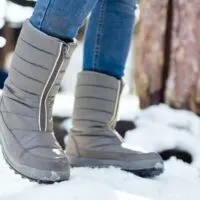 best vegan winter boot brands, warm grey boots in the snow