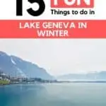A picture of Lake Geneva in the winter. The lake is calm without anything on the water. A bird is seen flying far away.