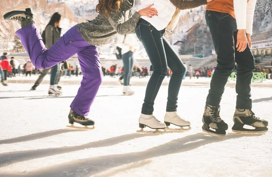 family getaways in milwaukee, three kids having fun ice skating