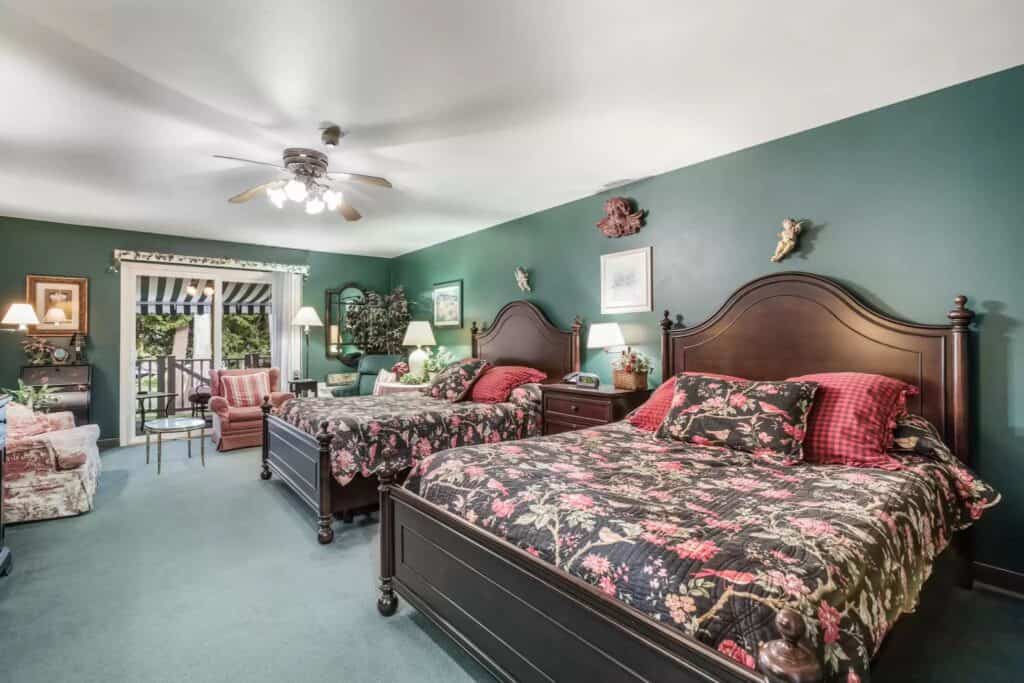 luxury Sheboygan, WI lodging, large doubel room with floral decor and porch