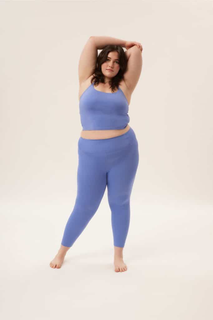 organic yoga clothing, woman stretching in yoga clothes