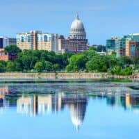 fun things to do in Madison, Wisconsin, view of the Madison skyline and reflection in the lake