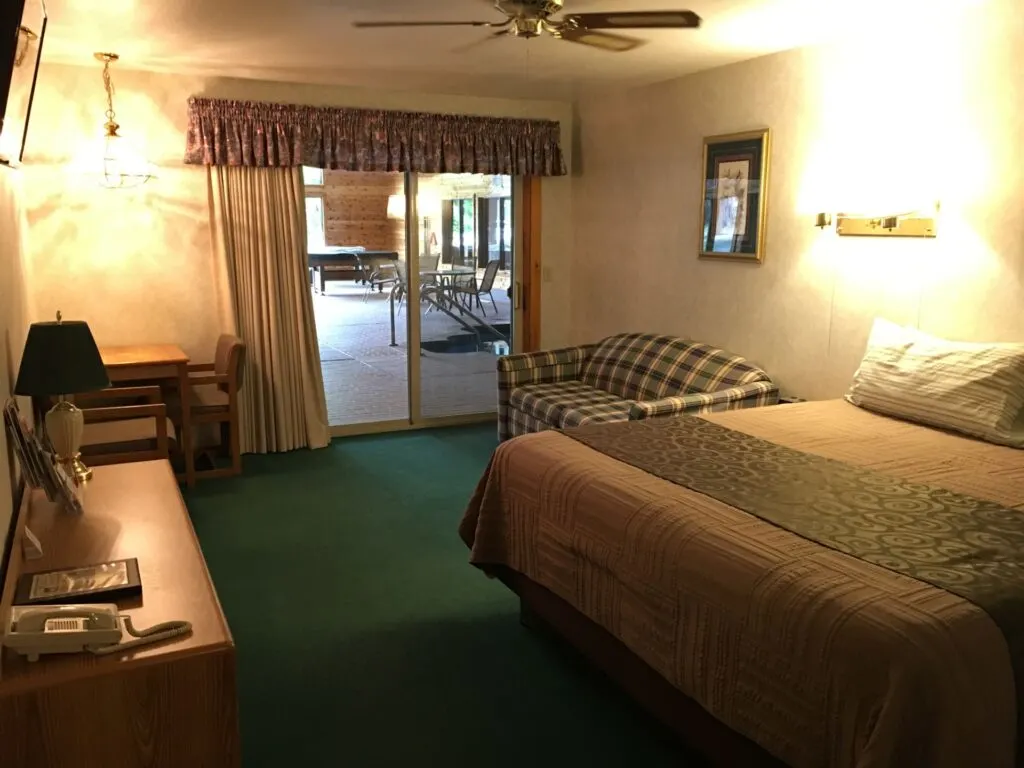 best hotels in Minocqua, Wisconsin, hotel room with glass door to pool area