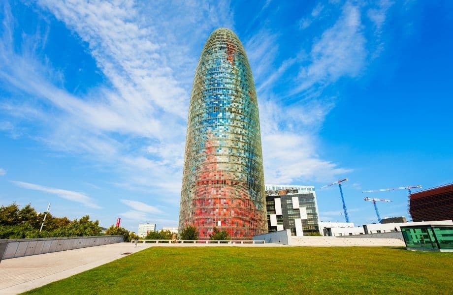 view of large bullet-shaped building, the torre glories, formerly torre agbar