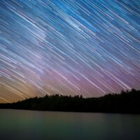 Unique Things to do in Minocqua Wisconsin, Star trails over Minocqua forest at night