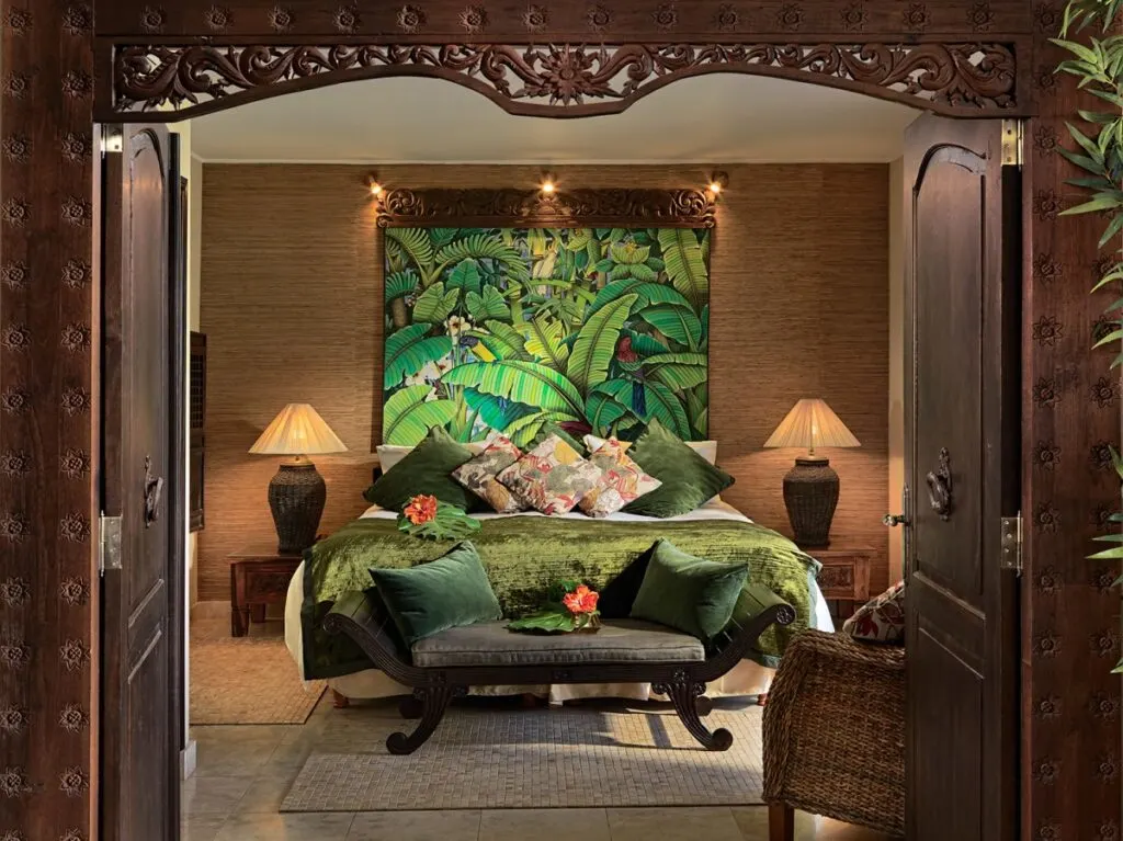 Best boutique hotels in Tenerife, doorway looking into hotel room with bed and settee decorated in green