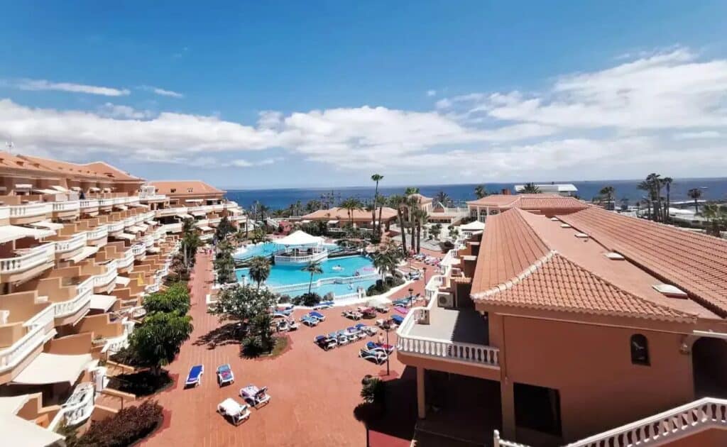 Top Costa Adeje hotels, aerial view over resort with large pool area