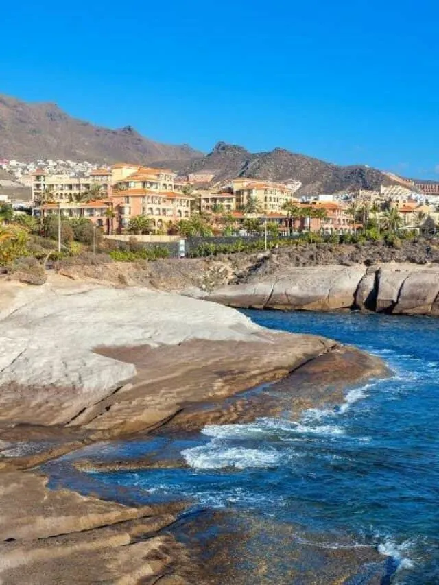 Costa Adeje things to do, view of Costa Adeje from the water with mountain in background, Resorts in South Tenerife