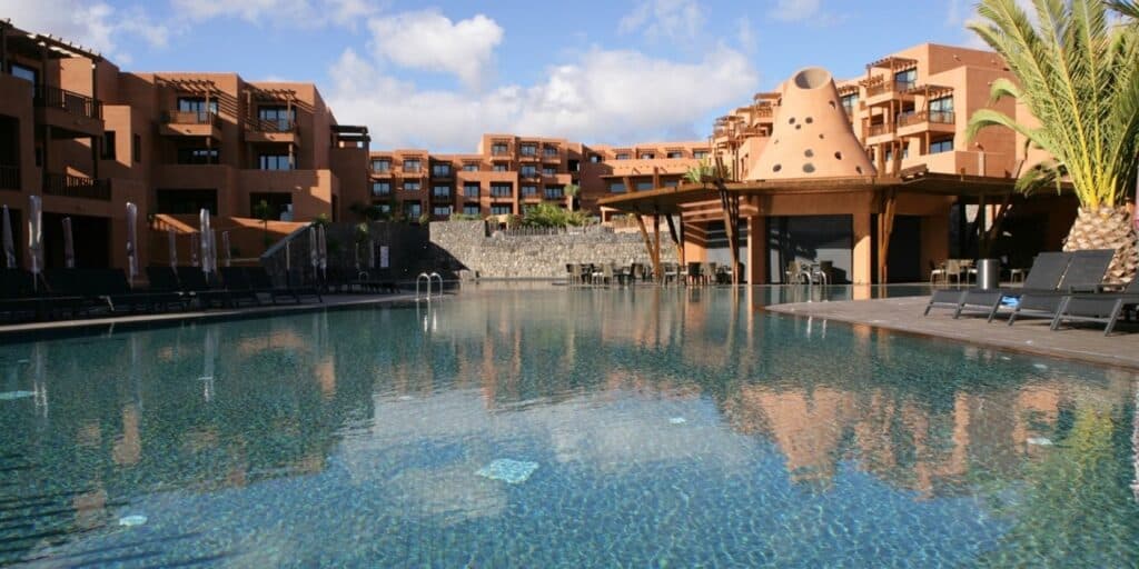 Eco spa resorts in Tenerife, exterior of hotel surrounding large pool area