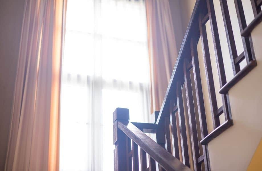 best places to visit in Green Bay, historic staircase backlit by open window