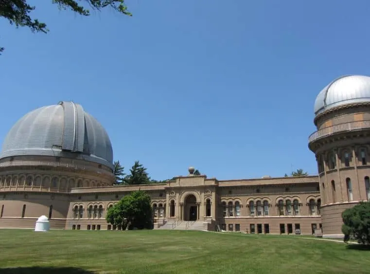 Spend April in Lake Geneva, view of Yerkes observatory, large stone building with two domed sections