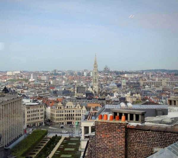 brussels-food-belgium-real-foodie, an aerial view of the city of brussels on a foggy day