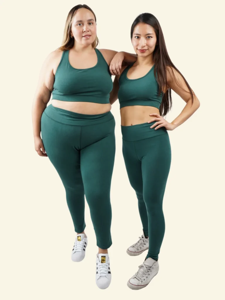best ethical yoga pants, two women in green leggings and bra standing side by side