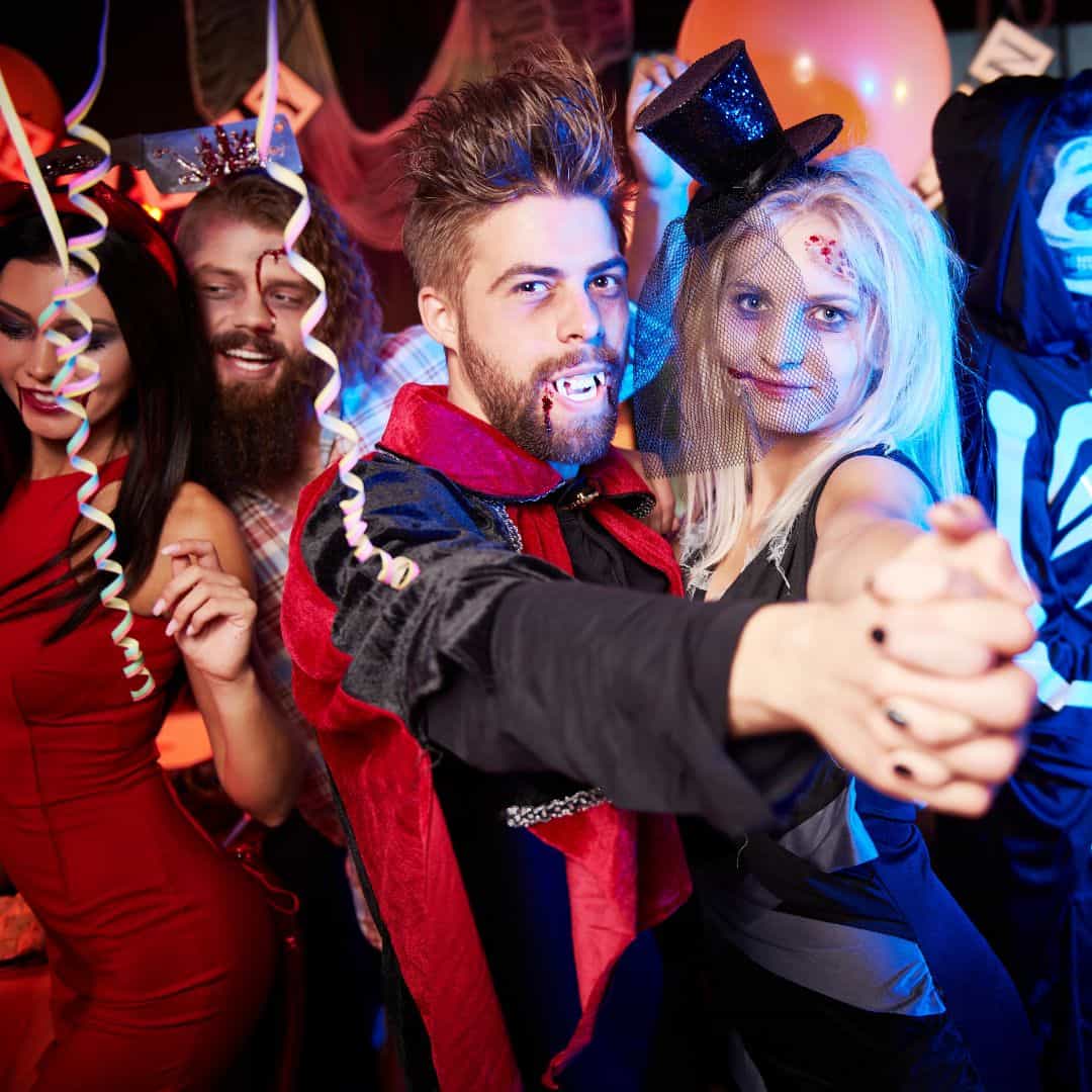 a group of people dressed up in halloween costumes