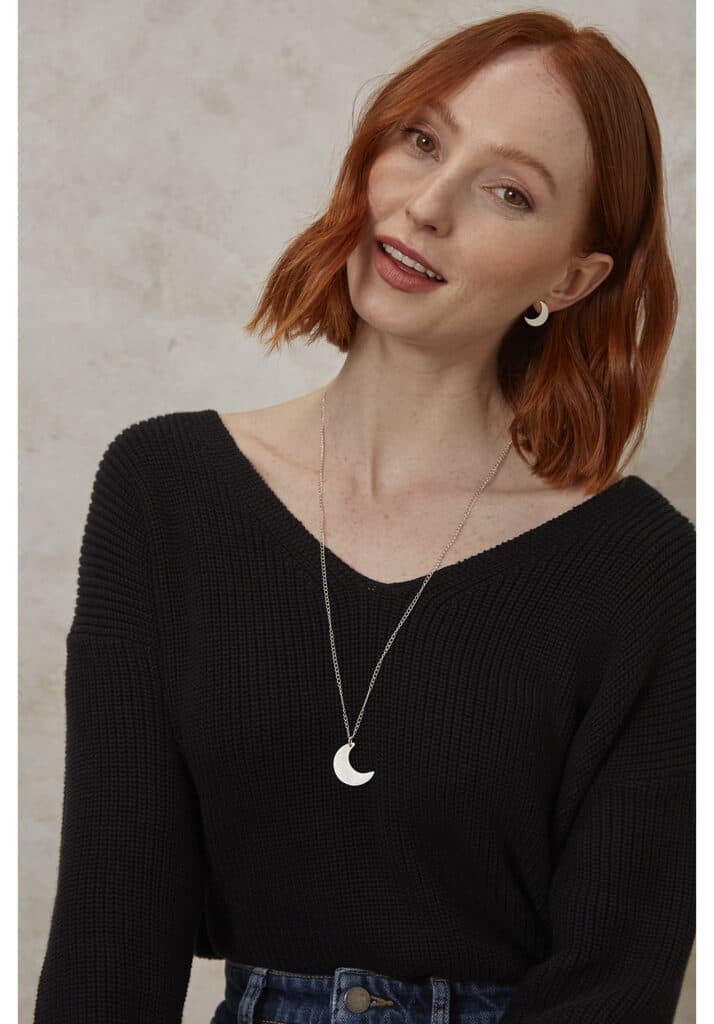 best ethical jewelers, red-head wearing matching crescent moon necklace and earrings