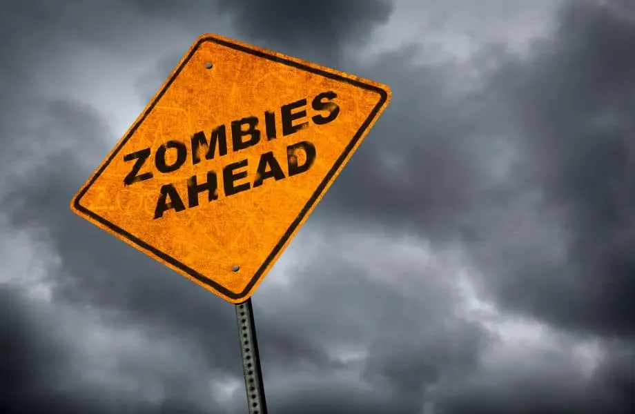 fun Halloween activities in Wisconsin, yellow caution sign reading ZOMBIES AHEAD under a dark grey sky