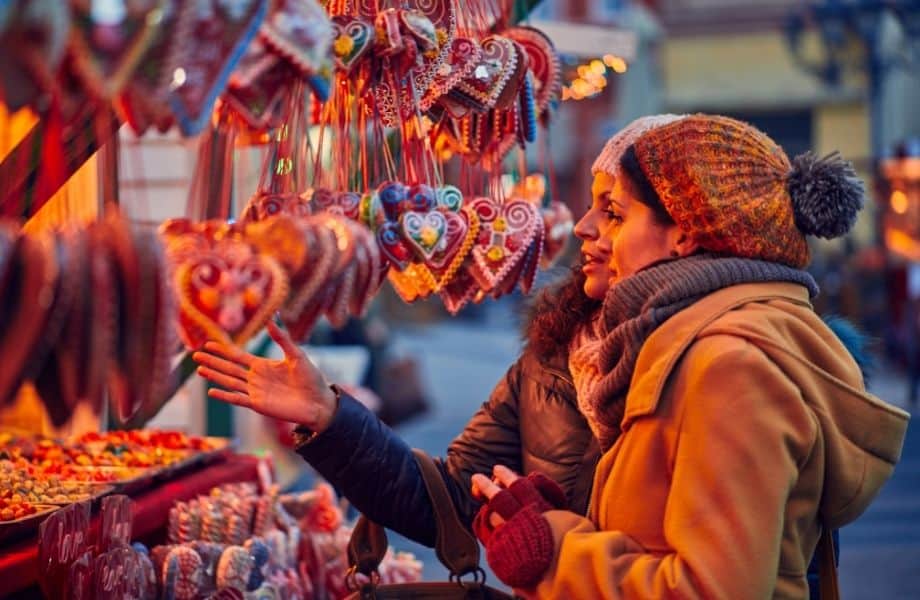 best Madison holiday market, two people looking at Christmas ornaments at a market stall