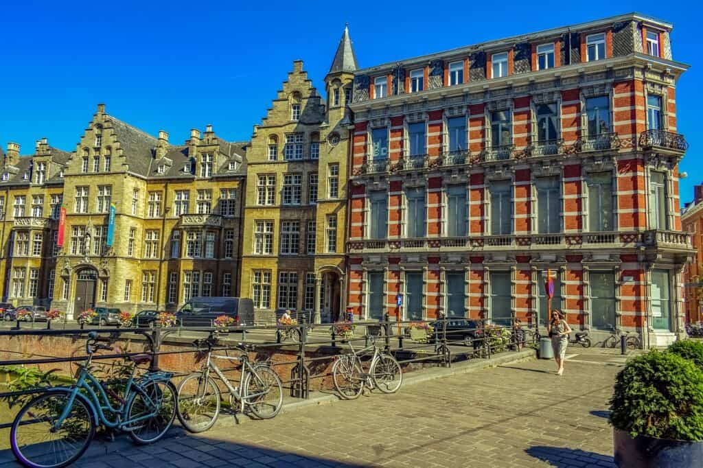 view on ghent belgium with buildings and a bikes parked on the front