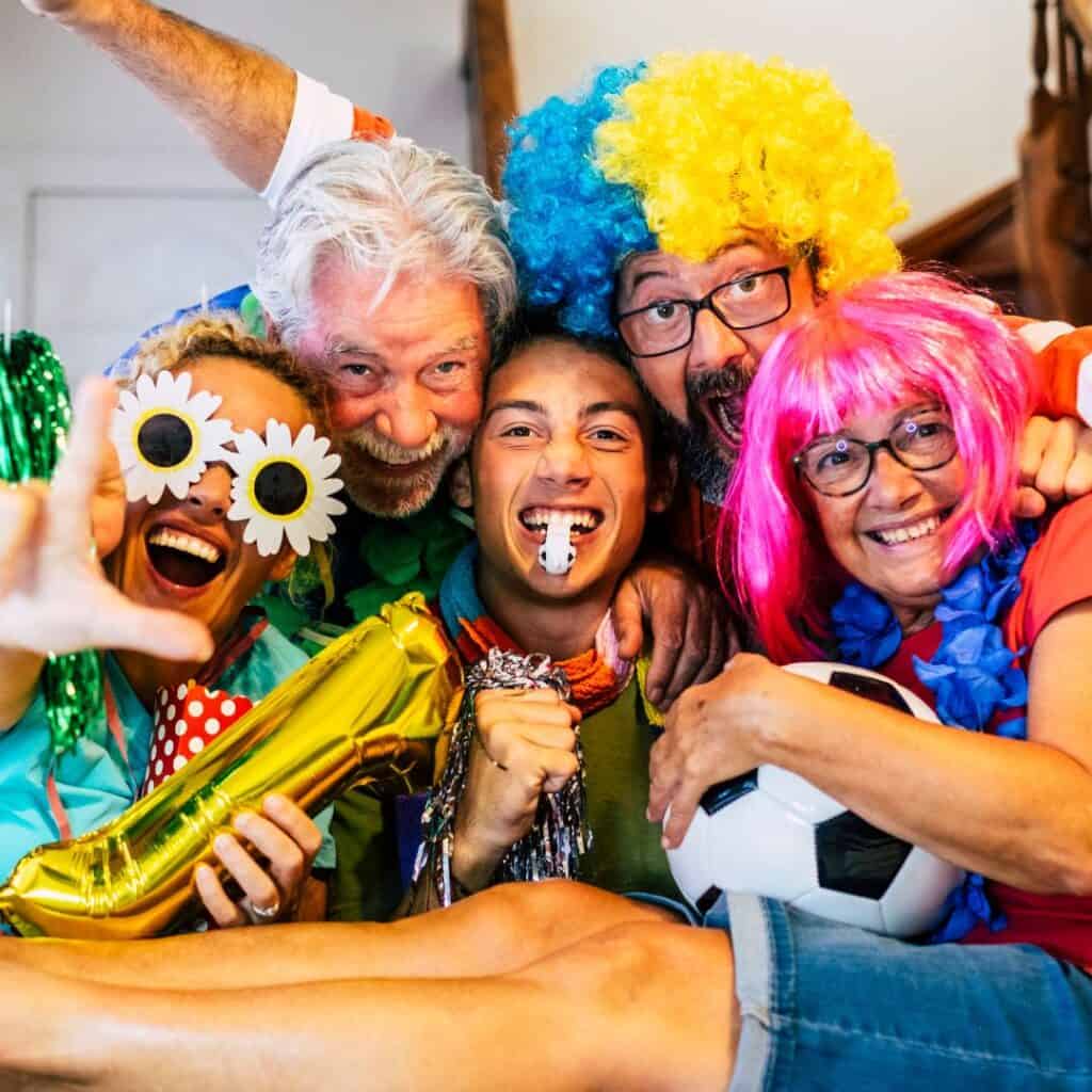 a family with different wigs and eyewear having fun