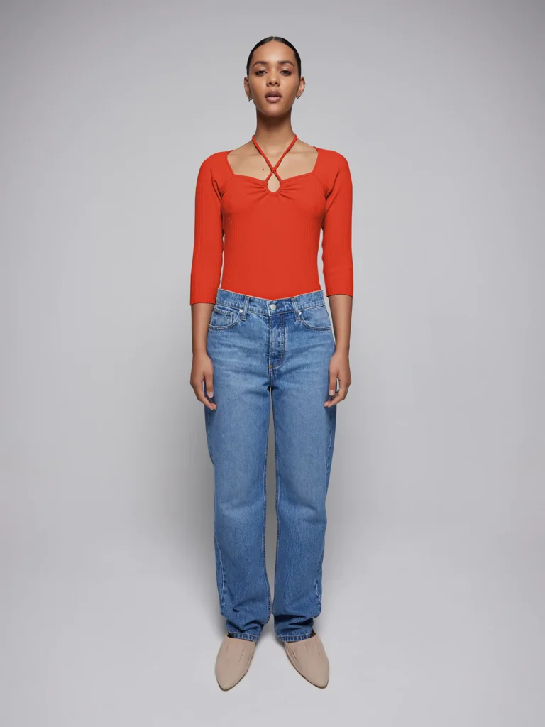 best ethically made jeans, black woman wearing blue jeans and red shirt