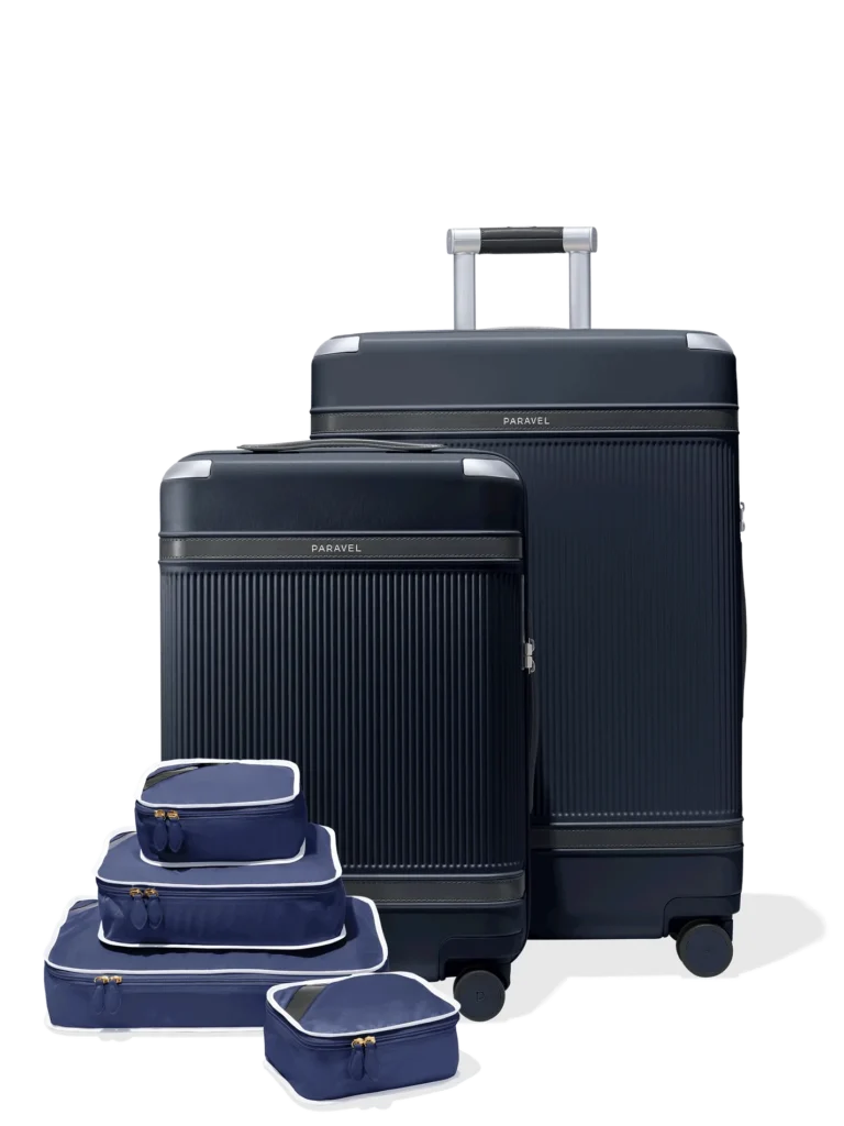 best eco friendly luggage sets, set of large dark blue hard suitcase, medium hard suitcase and four matching packing cubes of different sizes
