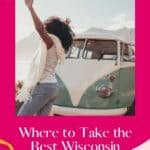 Pin with image of a black woman with her arms raised next to a white and mint green vw bus looking out at the water with mountains in the distance, text on pin reads "Where to take the best Wisconsin road trips"