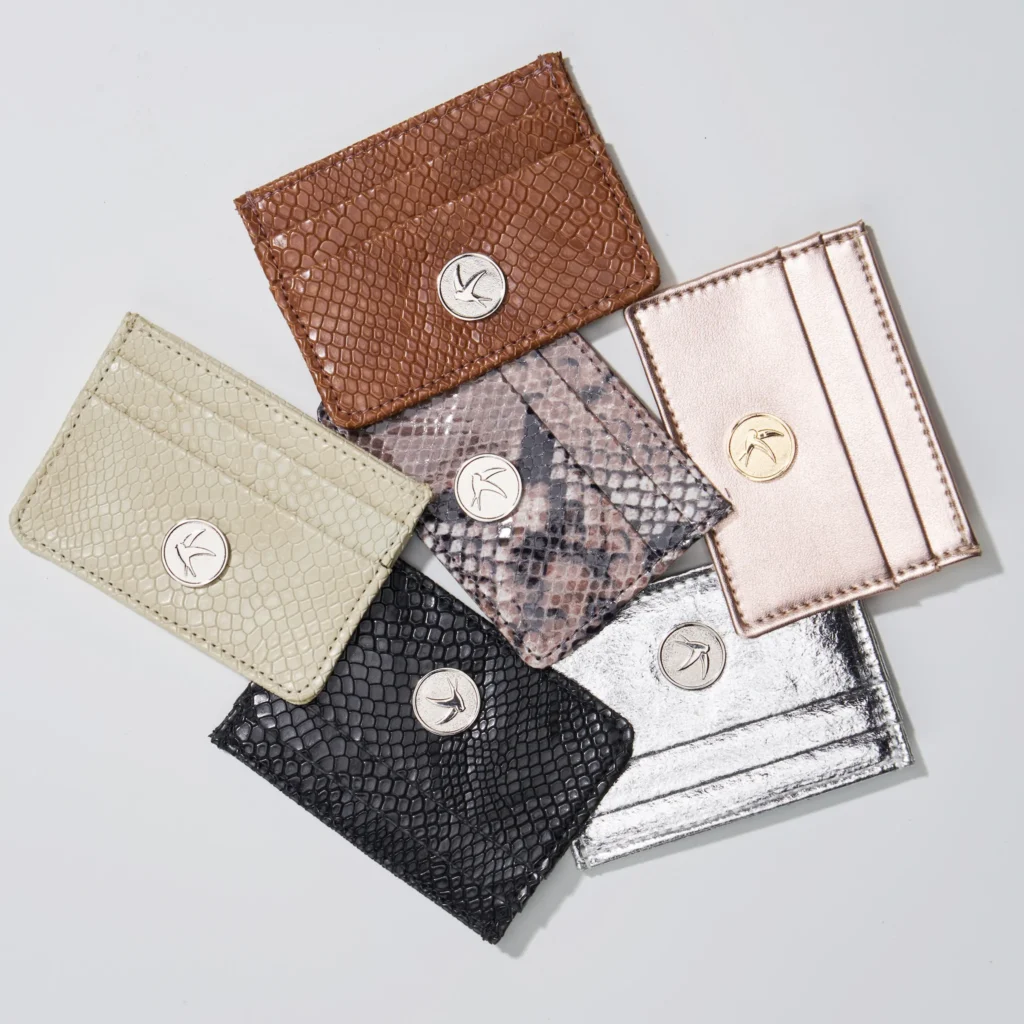 best sustainable wallet brands, selection of several wallets in different colors