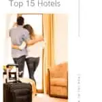 Pin with image of couple in a hotel room looking out of their window with their packed black suitcase at the forefront, text above image reads "Where to Stay in Eau Claire: 15 Top Hotels"