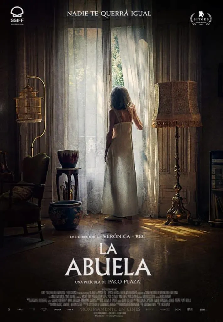 Watch your favourite best movies that take place in spain, movie poster for La Abuela with old woman standing in living room looking out of tall French windows